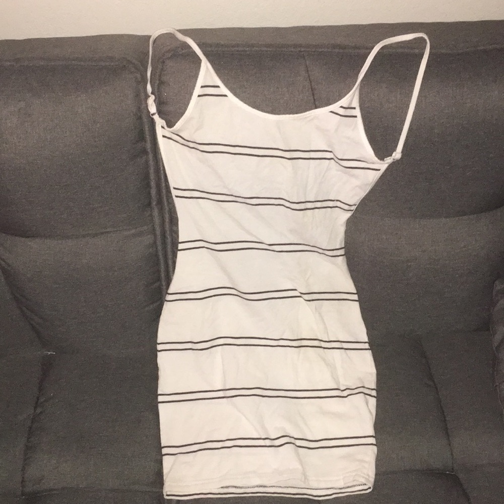 Tight dress, low cut back